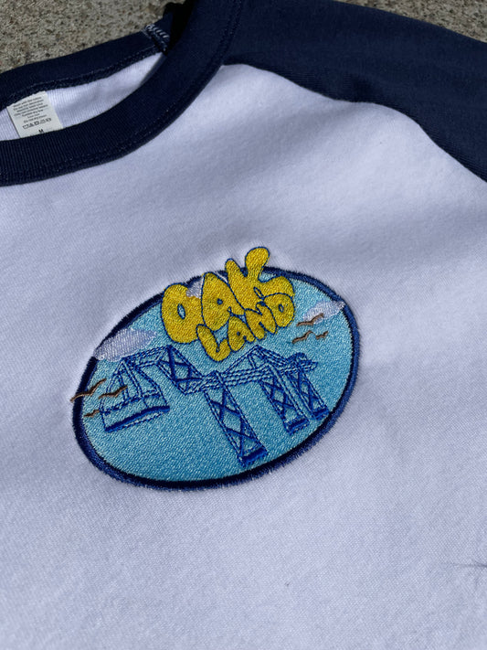 For The Love Of Oakland | Navy Raglan Baby Tee (Women's Fitted Crop)